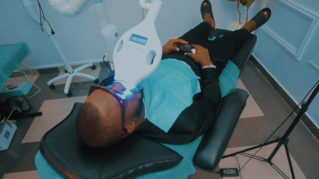 dentist in Lagos performing dental check-up