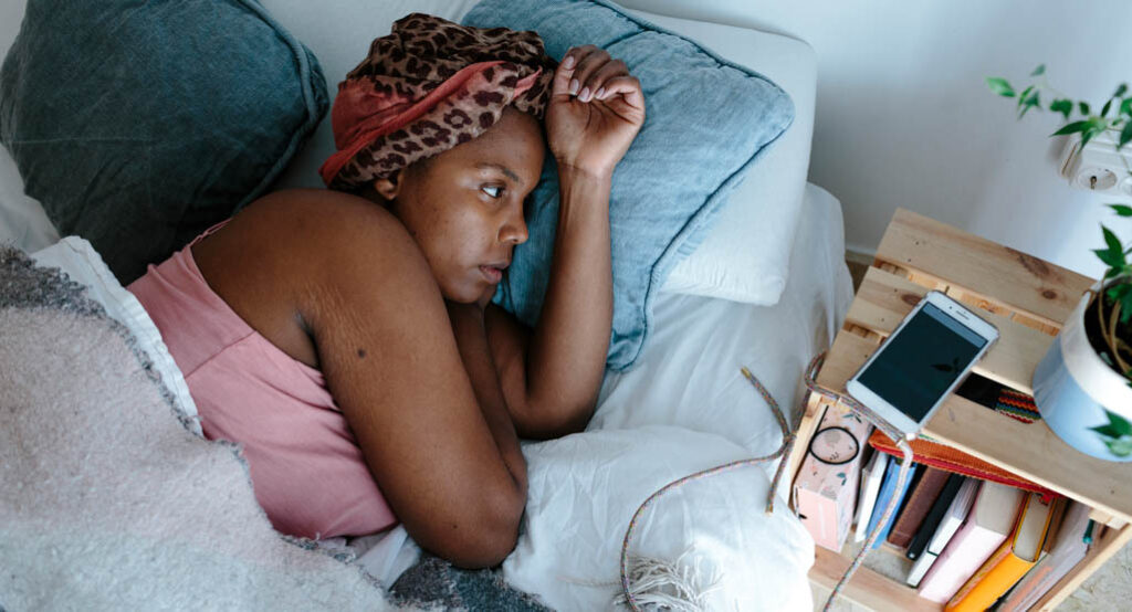 resting with ice pack after tooth extraction